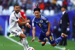 Hussein Ali et l'Irak ont réussi à renverser le Japon (2-1) de Takumi Minamino en phase de poules mais ont chuté en 8es face à la Jordanie (2-3). (M. Darlington/Reuters)