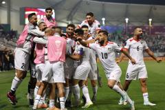 La joie des Palestiniens lors de leur victoire face à Hongkong (3-0), mardi. (T. Al-Sudani/Reuters)