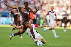 Pas de vainqueur entre Morgan Guilavogui (Sankt Pauli) et Arthur Theate (Francfort). (J. Halisch/Witters)